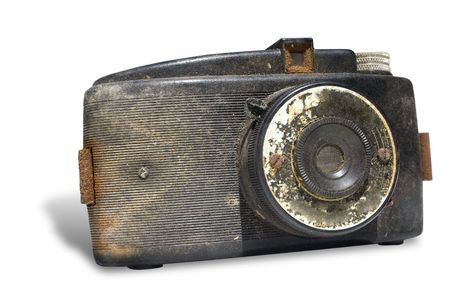 an old rusty camera on a white backgroundの写真素材