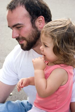 a father and daughter enjoying life together