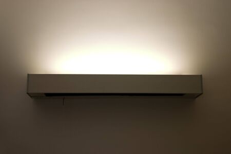 a light shining up onto a wallの写真素材
