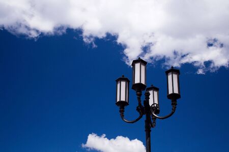 white lamp against a background blue skyの写真素材