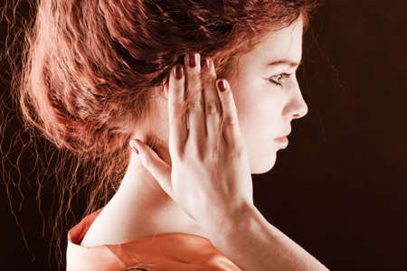 Young pretty girl with red hair