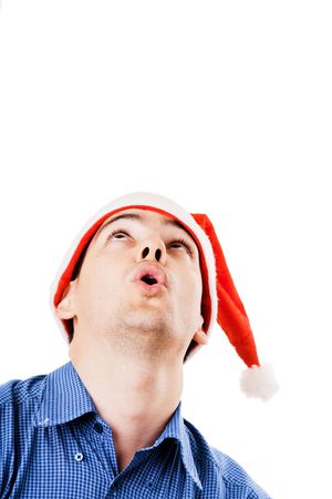 Young smiling man in Santa hatの写真素材