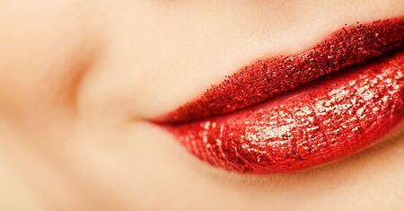 Woman smiling lips with makeup close-upの写真素材