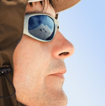 Male portrait on blue sky backgroundの写真素材