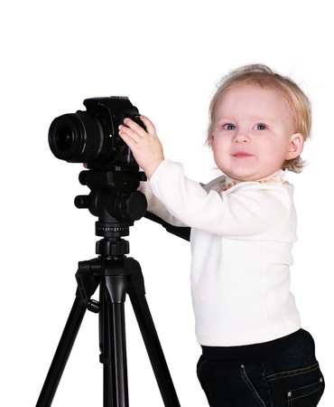 A child with a camera in the studioの写真素材