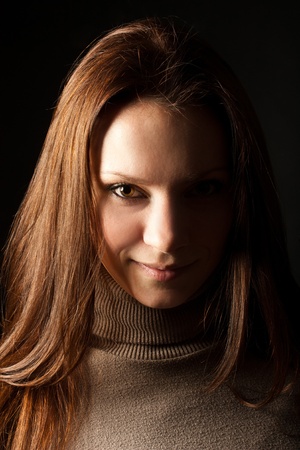 portrait of a young girl in fas on a black background の写真素材