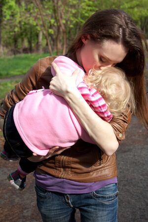Outdoor portrait of Young mother with little daughterのeditorial素材
