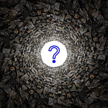 Stone tunnel with question markの写真素材
