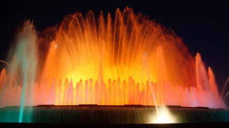 Magic Fountain of Montjuïc, Barcelona, Spain. Night shot with long exposure and blurred colorful water.の写真素材