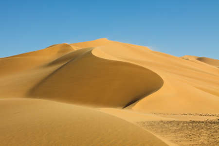 Beautiful Sand Dune at Erg Tamesset, Sahara Desert, Libyaの写真素材