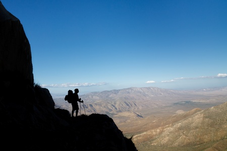 Silhouette of a hiker viewing Anza-Borrego Desert State Park, Southern California, USAの写真素材