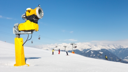 Snow cannon used to make artificial snow at ski resort in the Alps.