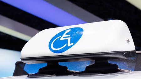 Disability sign   handicap sign on top of  car