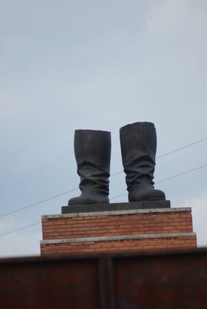 The remaining part of the huge Stalin monument (Stalin's Grandstand) -Memento Park - Budapestの写真素材