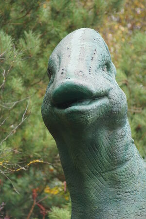 A large Parasaurolophus dinosaur amongst the treesの写真素材
