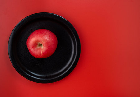 Happy Chinese New Year. Apple, Chinese Gold Sycee, angpao or red packet monetary gift for a symbol...