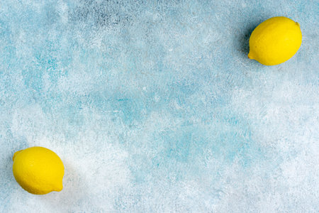 whole yellow lemons isolated on bright background. Lemons citrus fruit, healthy, summer. Copy spaceの写真素材