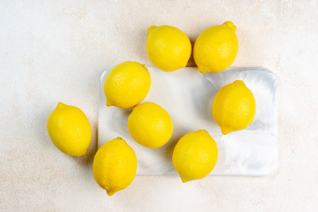 whole yellow lemons isolated on bright background. Lemons citrus fruit, healthy, summer. Copy spaceの写真素材