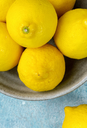 whole yellow lemons isolated on bright background. Lemons citrus fruit, healthy, summer. Copy spaceの写真素材