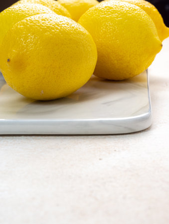 whole yellow lemons isolated on bright background. Lemons citrus fruit, healthy, summer. Copy spaceの写真素材