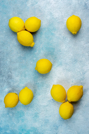 whole yellow lemons isolated on bright background. Lemons citrus fruit, healthy, summer. Copy spaceの写真素材