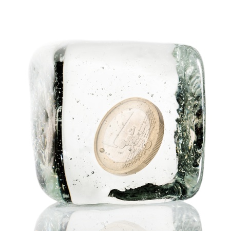 One euro coin frozen in ice cubeの写真素材