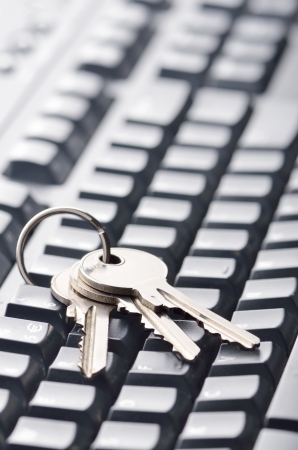 Keys on computer keyboard, symbolising computer related securityの写真素材