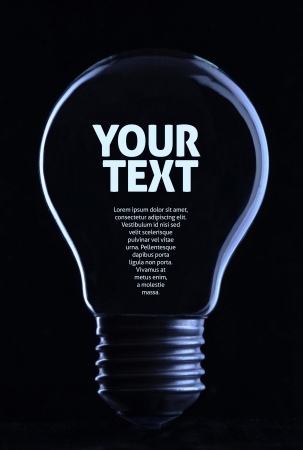 Light bulb on black background with copy textの写真素材