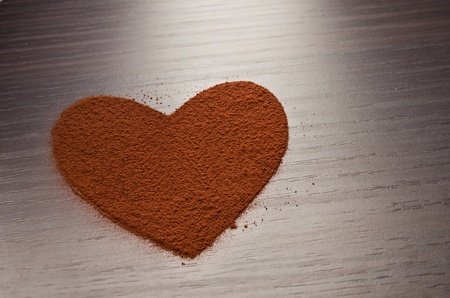 Heart made from cocoa powderの写真素材