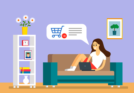 A beautiful young girl sits on the couch with a laptop and makes purchases online through a credit card. modern shrping. vector illustrationのイラスト素材