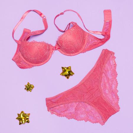 Underwear as gift for beloved woman. Sexy lace lingerie set of bra and panties with wrap bowsの写真素材