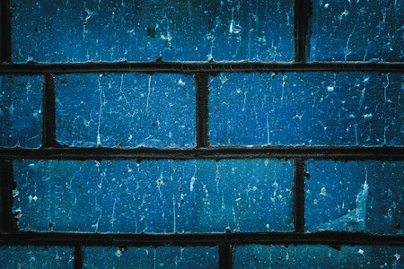Shabby blue brick blocks close-up texture. Dark grunge backgroundの写真素材