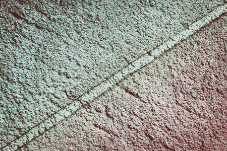 Retro style background. Textured plaster with diagonal stripe. Blue and red color transitions