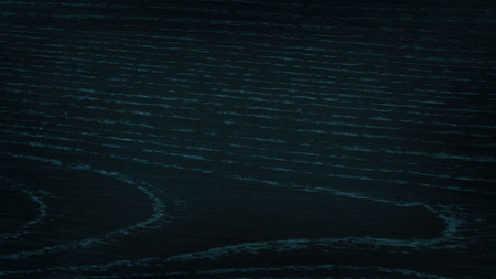 Dark blue background of wood surface with detail texture. Wooden backdropの写真素材