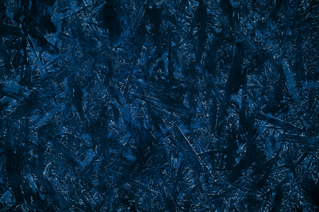 Dark blue grunge textured background. Pressed wood chips slab surfaceの写真素材