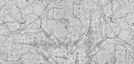 Hardened cement mortar rough gray texture. Old damaged grungy concrete. Gray grunge widescreen...