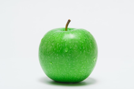 fresh green apple, isolated on white backgroundの写真素材