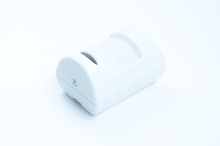 White motion sensor isolated on white background.の写真素材