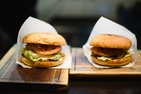 Preparing burgers at the barbecue in cafeの写真素材