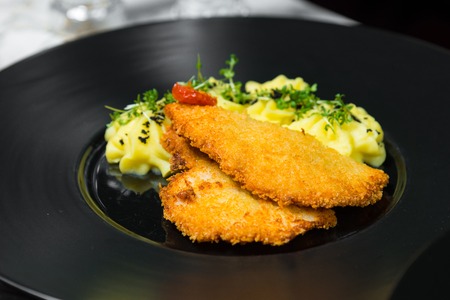 Chef's specialty presented in restaurant on served table.の写真素材