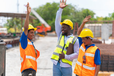 Foreman worker team making high hands over head, Success and Teamwork Concepts