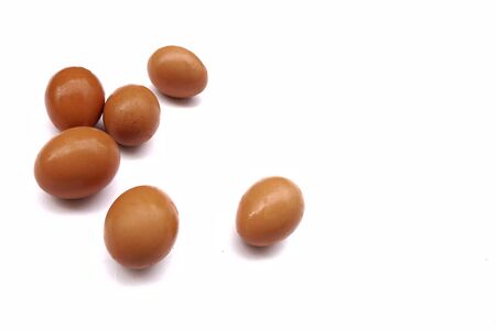 Raw eggs isolated on white background.の写真素材