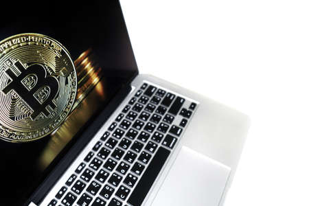 Electronic money Bitcoin on the monitor laptop computer with copy space for word.の写真素材