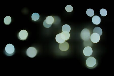 Abstract Bokeh Blur Light Texture on Dark Background.Night light