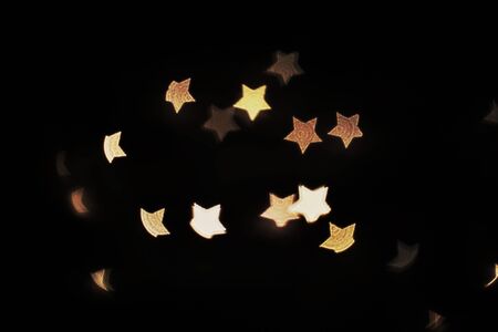 Abstract Star Bokeh Blur Light Texture on Dark Background.Beautyful Night light in the City.の写真素材