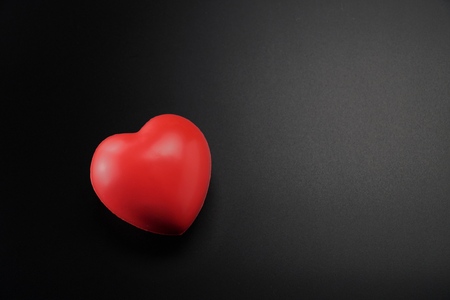 Shape of Red Heart on black background,Concept of Love and Health care.World heart day,Insurance,World health day.Valentine's day.の写真素材
