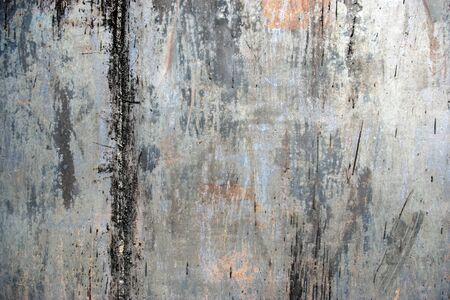Photo of the t xture of rusty painted metal