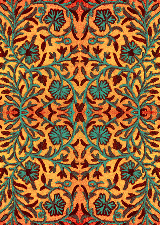 Bright embroidered bedspread with floral Oriental patternの写真素材