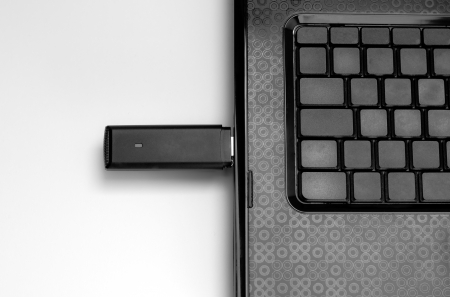 Notebook with a USB stickの写真素材