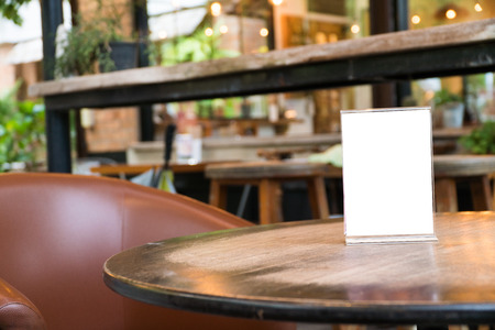 mock up menu object in cafe and restaurant,blank screen for booklet with white sheets of paper on...